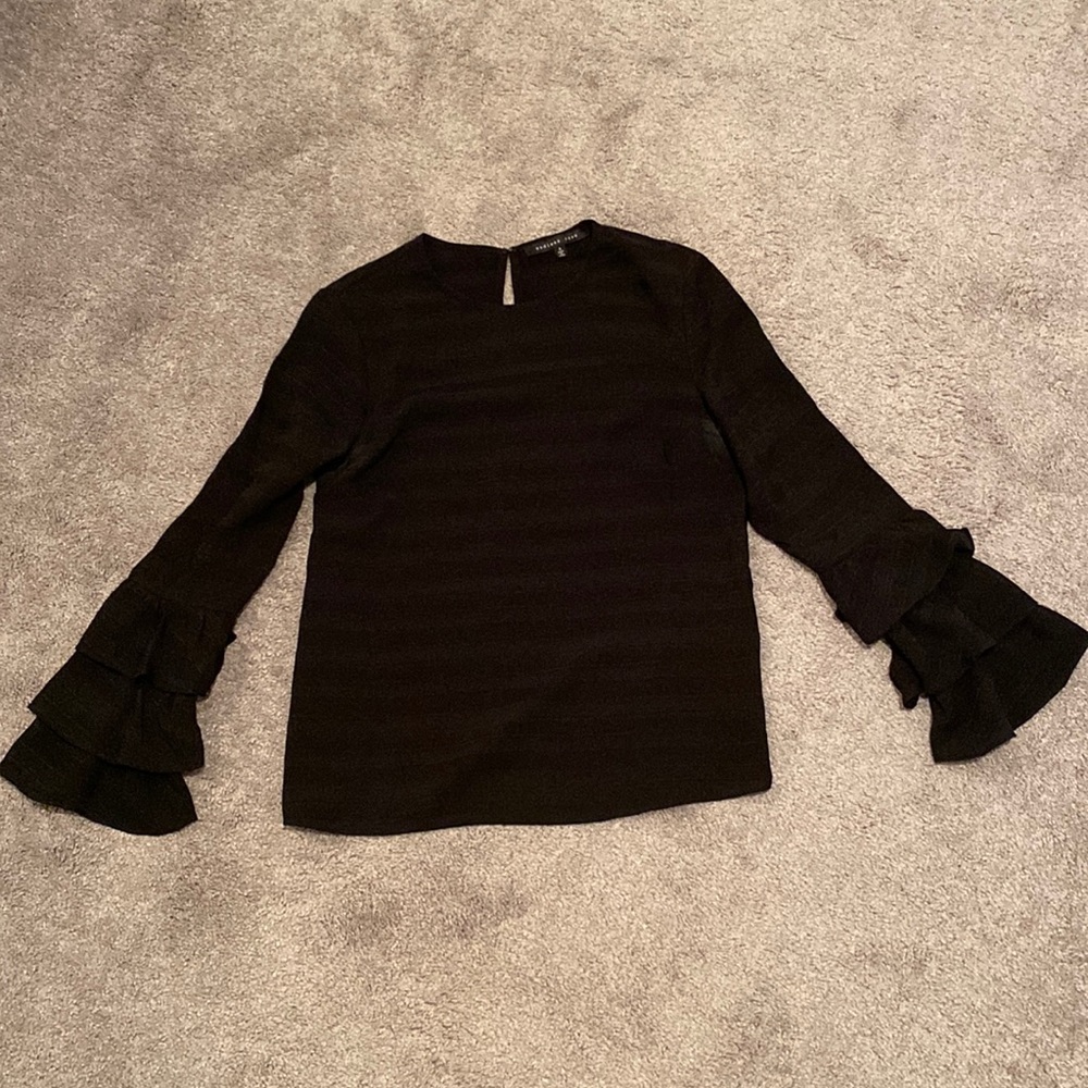 Black blouse with bell ruffle sleeves. Size small
